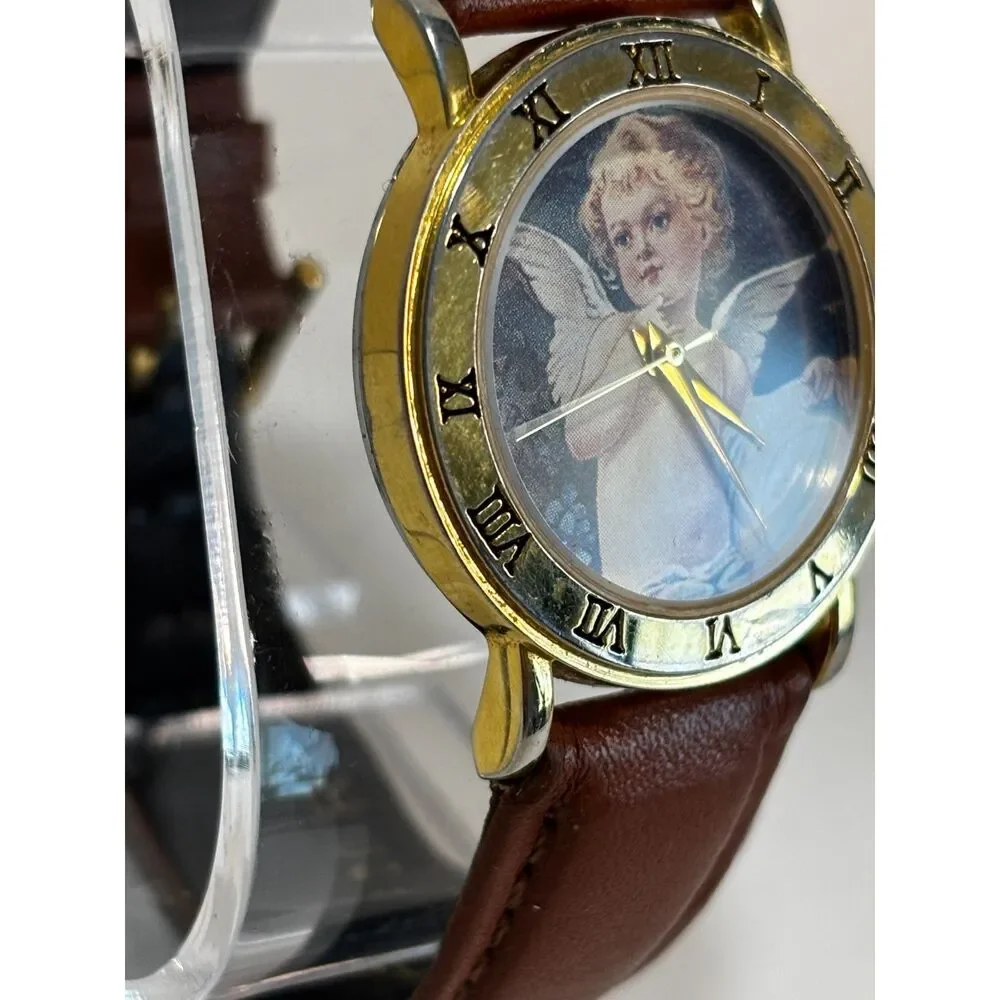 VTG Circa Angels Roman Numeral bezel gold-tone women's watch, working